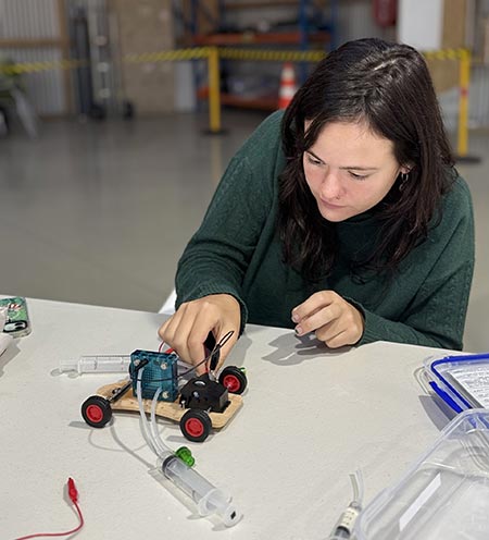 Juliet Nelson demonstrating the hydrogen car activities