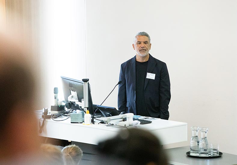 Derek Kawiti opening the symposium