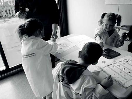 Children working on Lab-in-a-Box science projects 